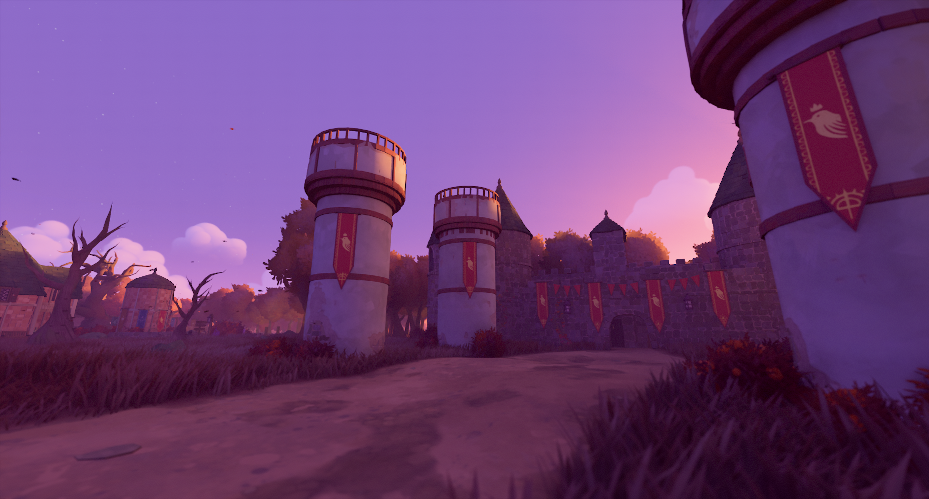 Three parapets atop towers guard the road to the castle.